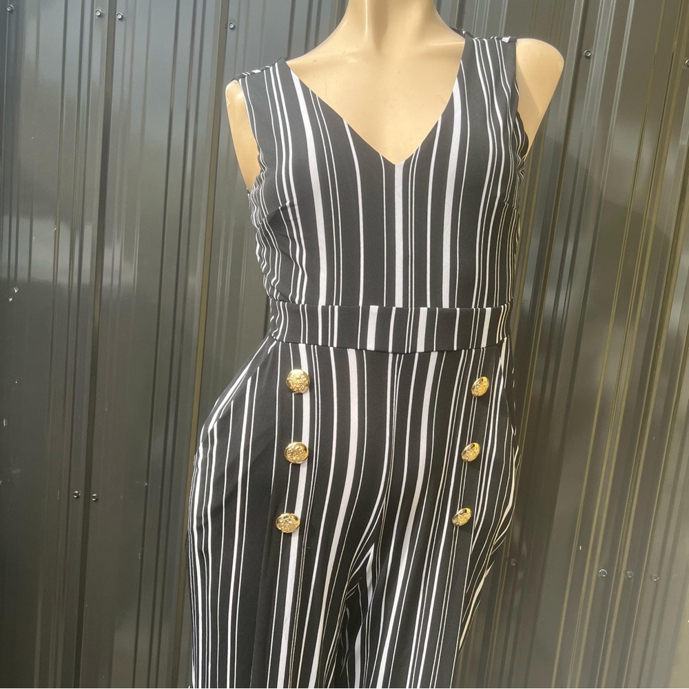 Chic Black and White Striped Jumpsuit with Gold Buttons